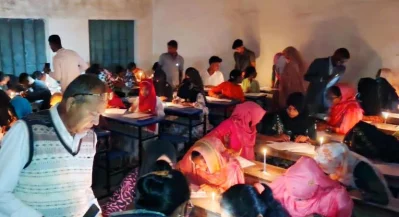 আলোহীন কেন্দ্রে মোমবাতির আলোয় এসএসসি পরীক্ষা অনুষ্ঠিত